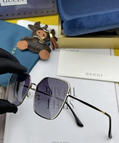 Gucci Silver Color Frame Black Lenses Sunglasses