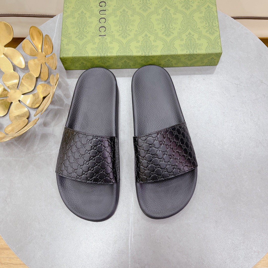 Gucci Women’s Embossed Gucci Slide Sandal Black For Women 407345