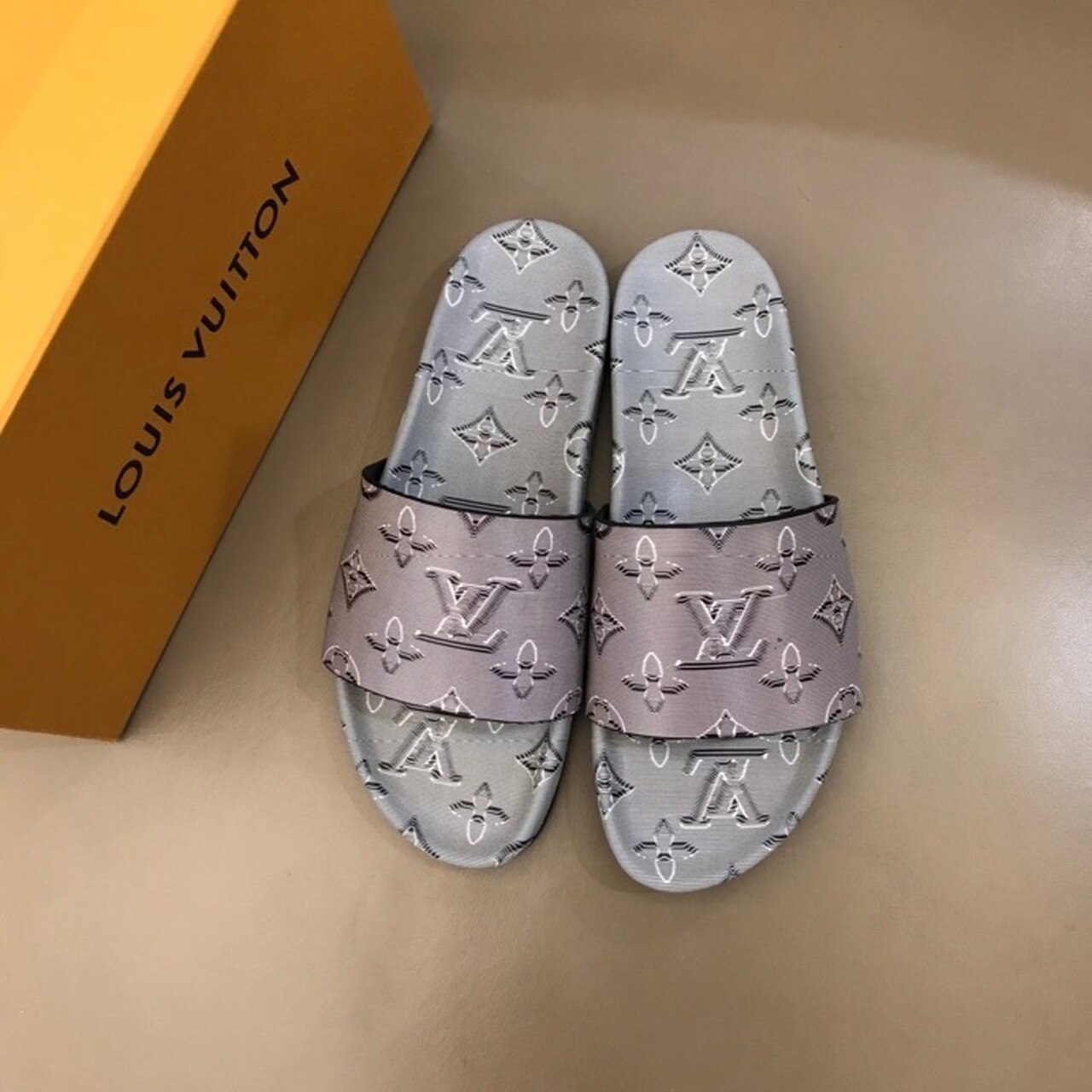 Louis Vuitton Waterfront Mule Monogram Embossed Metallic Rubber Gray For Women LV